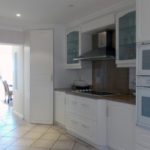 kitchen at self catering apartment in gordons bay